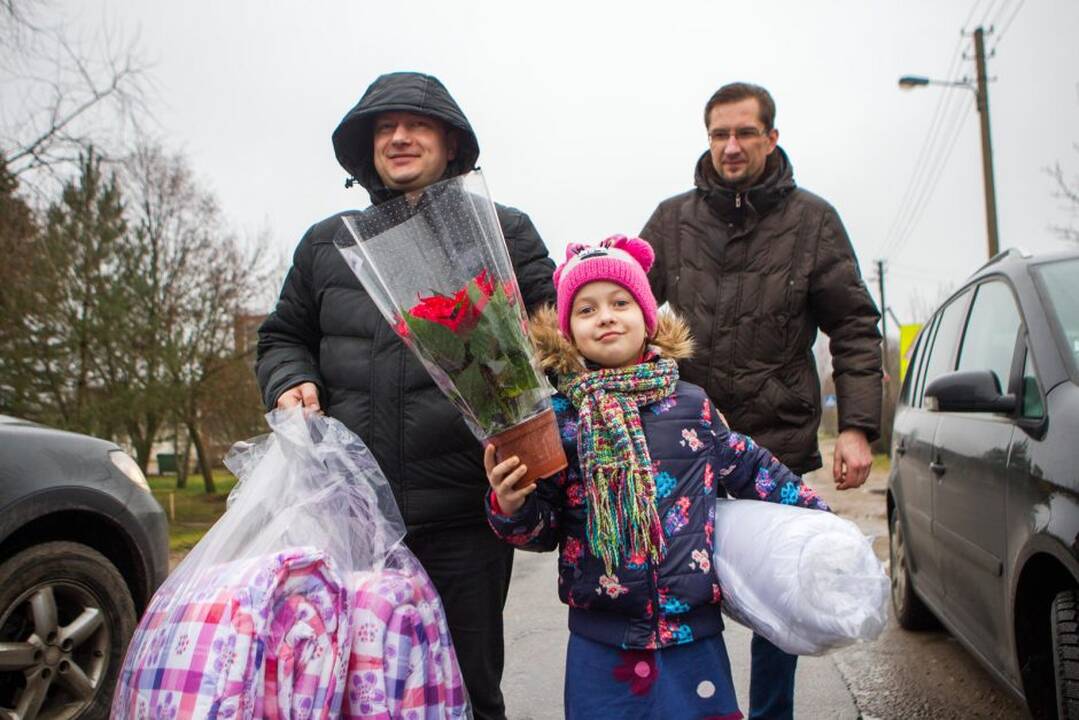 Audi klubas aplankė sunkiai gyvenančią šeimą