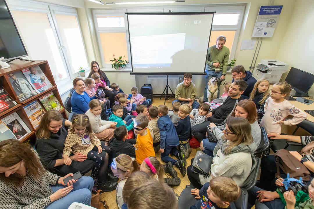 Pakvietė vaikus skaityti su šunimis