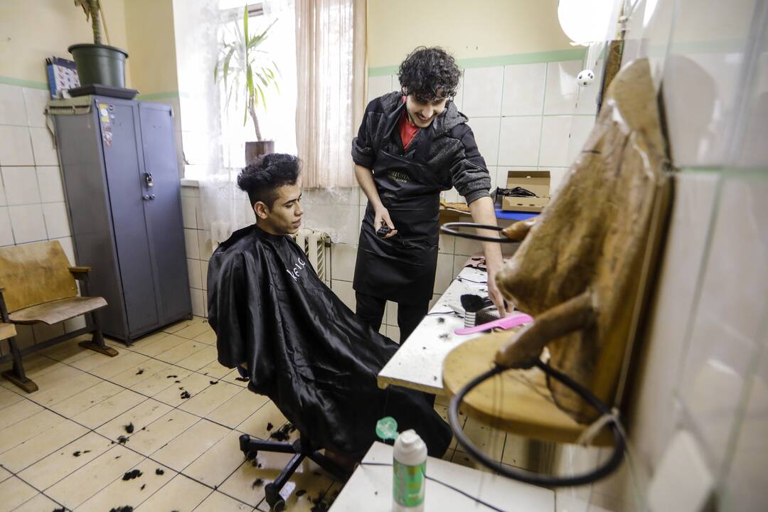 Migrantai Kybartų užsieniečių registracijos centre