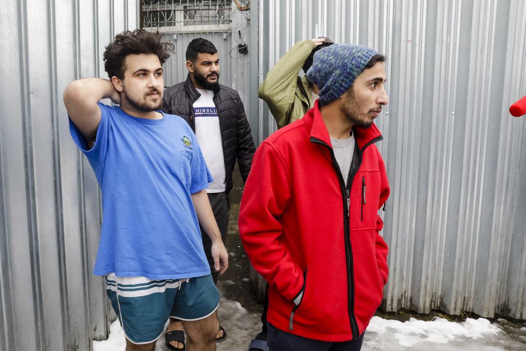 Migrantai Kybartų užsieniečių registracijos centre