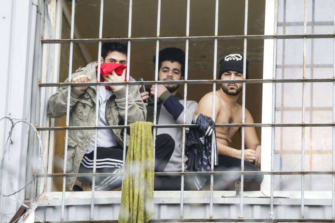 Migrantai Kybartų užsieniečių registracijos centre