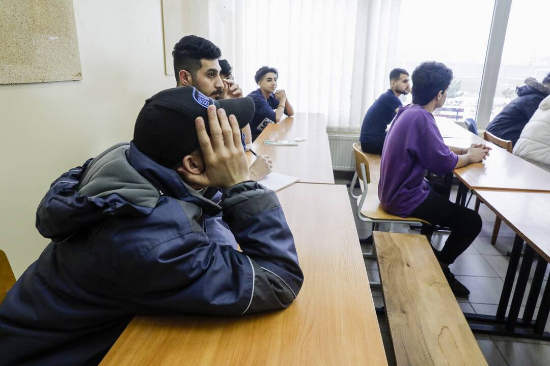 Migrantai Kybartų užsieniečių registracijos centre