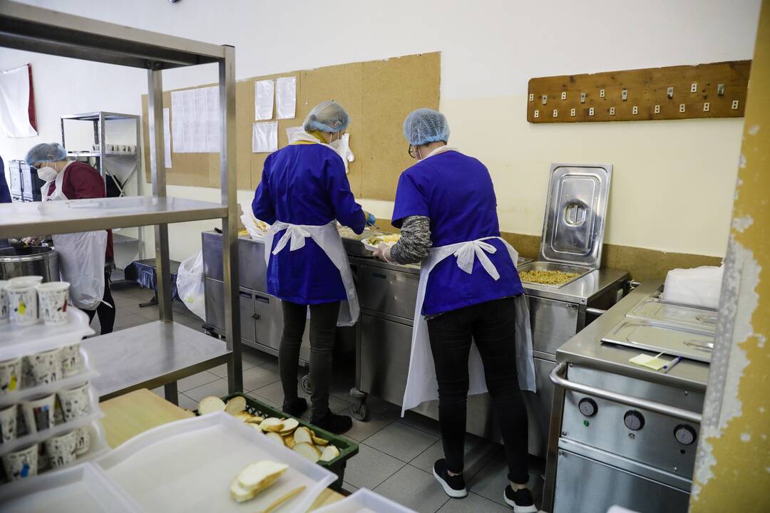 Migrantai Kybartų užsieniečių registracijos centre