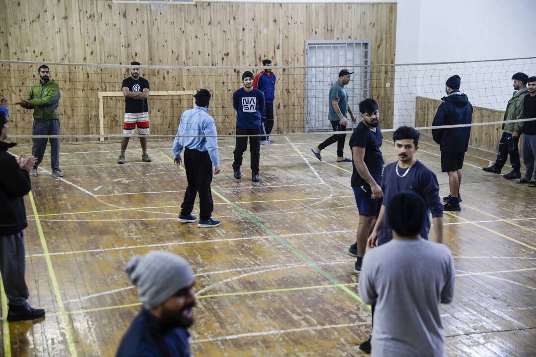 Migrantai Kybartų užsieniečių registracijos centre
