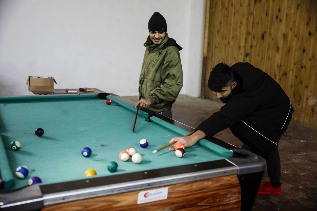 Migrantai Kybartų užsieniečių registracijos centre