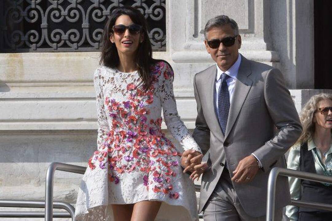 A. Alamuddin: tiesiog norėjau apkabinti vestuvinės suknelės dizainerį