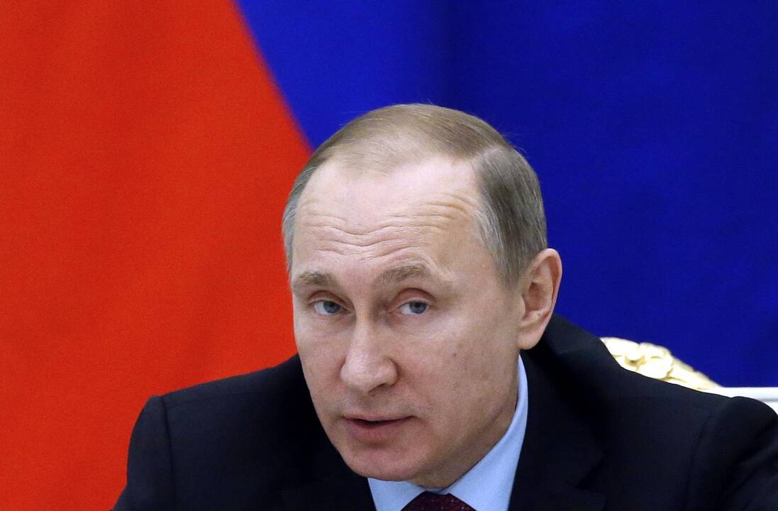 Ant marškinėlių – V. Putinas ir žodžiai „Ieškomas pats pavojingiausias nusikaltėlis“