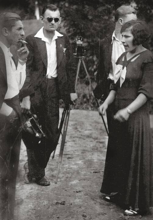 Veidai: 1938 m. skautų paradą stebi gen. Stasys Raštikis, skautų vadovo pavaduotojas Jurgis Alekna, prezidentas Antanas Smetona su žmona Sofija ir tuometinis švietimo ministras. 