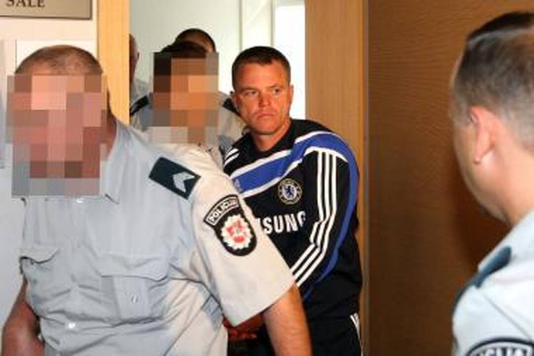 Šaudynėmis įtariamas "kamuolinių" gaujos lyderis Giedrius Janonis suimtas (papildyta)