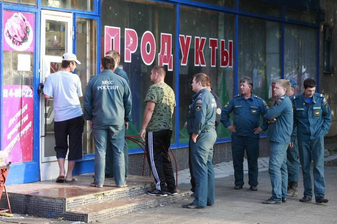 Apsilankęs potvynių zonoje, V.Putinas šalyje paskelbė gedulą