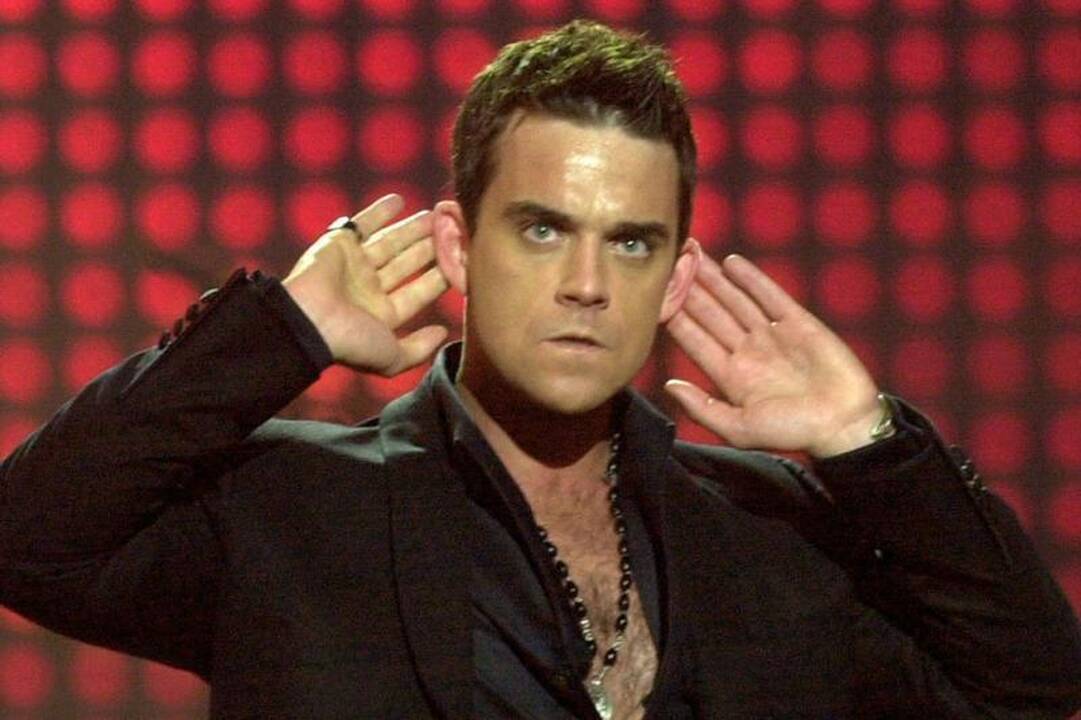 Robbie Williams: mano pirmasis ištartas žodis buvo “F***”