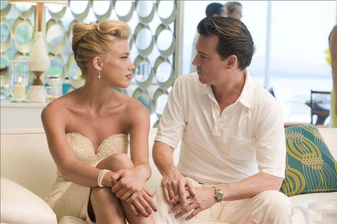 Kodėl Johnny Deppui nepavyko pakerėti Amber Heard?