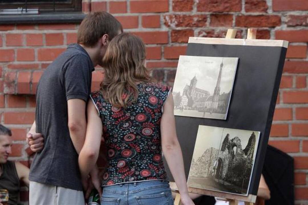 Senamiesčio šventėje – fotoaparatų blyksniai