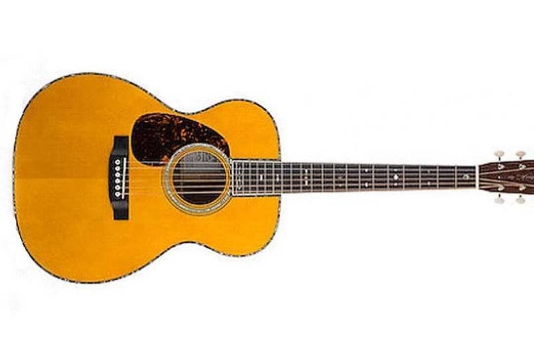 Ant brangiausiai pasaulyje parduotos gitaros – Bryano Adamso parašas