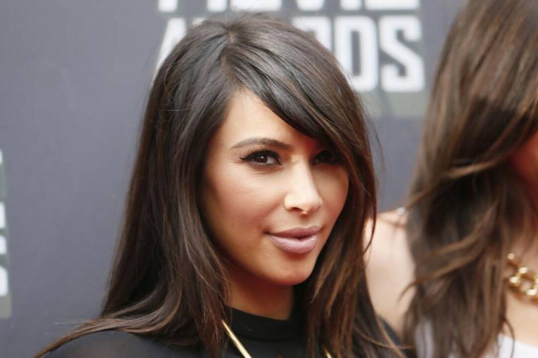 Televizijos žvaigždė K. Kardashian pagimdė mergaitę