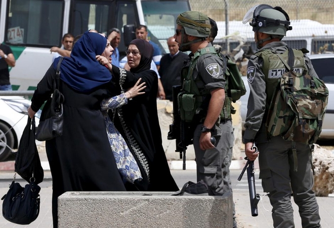 Izraelio pareigūnai nušovė palestiniečių užpuolikų porą