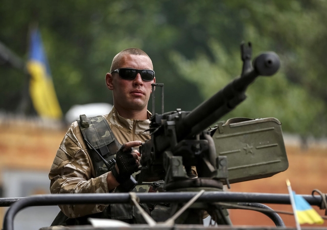 „Amnesty International“: abi Ukrainos konflikto pusės vykdė karo nusikaltimus