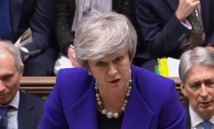 Th. May sako turinti naują „Brexit“ mandatą