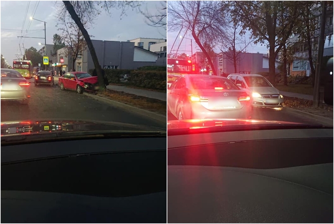 Avarija Kovo 11-osios gatvėje: po smūgio vienas automobilis rėžėsi į medį