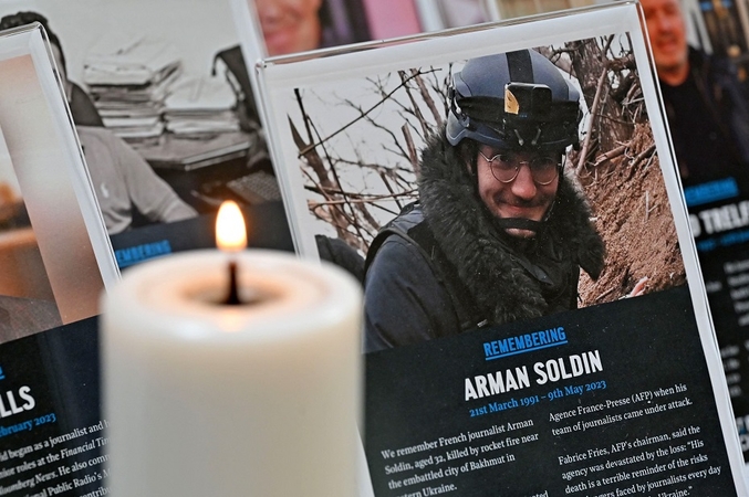 Kremlius reiškia liūdesį dėl AFP žurnalisto žūties: tvirtina, kad jos aplinkybės neaiškios