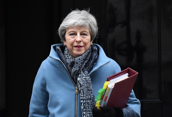 Th. May: galiu įvykdyti „Brexit“, jei parlamentarai šią savaitę parems mano sutartį