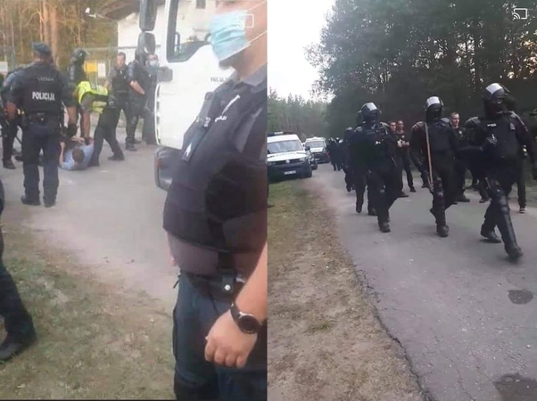 Žmonės nuo kelio prie Rūdninkų poligono nustumti jėga, neramumus malšino riaušių policija 