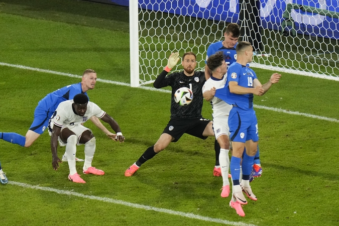 Anglijos ir Slovėnijos rinktinių rungtynių momentas