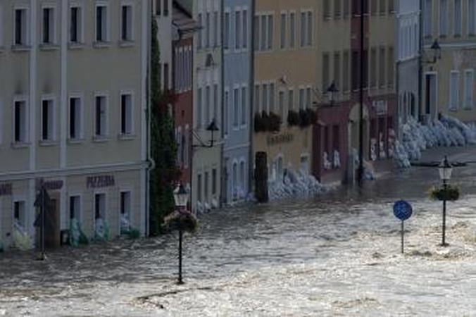Liūtys ir potvyniai vėl užklupo Lenkiją ir jos kaimynes