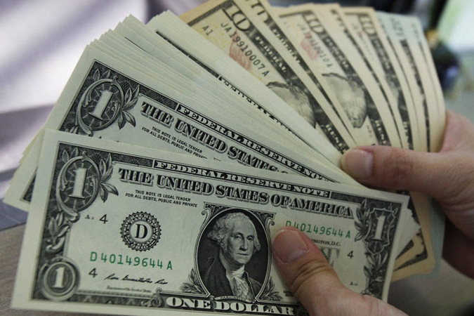 JAV bandyta atsiskaityti milijono dolerių banknotu