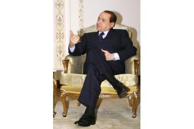 S.Berlusconi pavadino B.Obamą įdegusiu