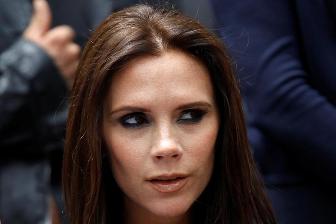 V.Beckham dėl nugaros skausmų įsispyrė į žemus batus (foto)