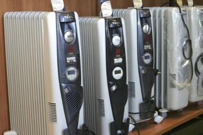 Išeitis: kol radiatoriai nekaista, kai kurie kauniečiai šildosi tepaliniais šildytuvais.